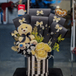 Elegant Teddy & Yellow Rose Box Arrangement with Black Envelopes