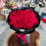 Elegant Crimson Rose Bouquet in Sleek Black Wrap