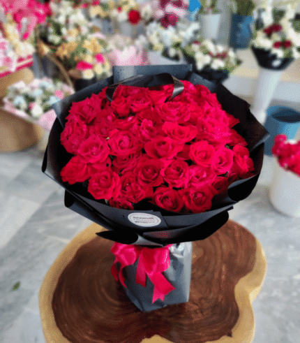 Elegant Crimson Rose Bouquet in Sleek Black Wrap